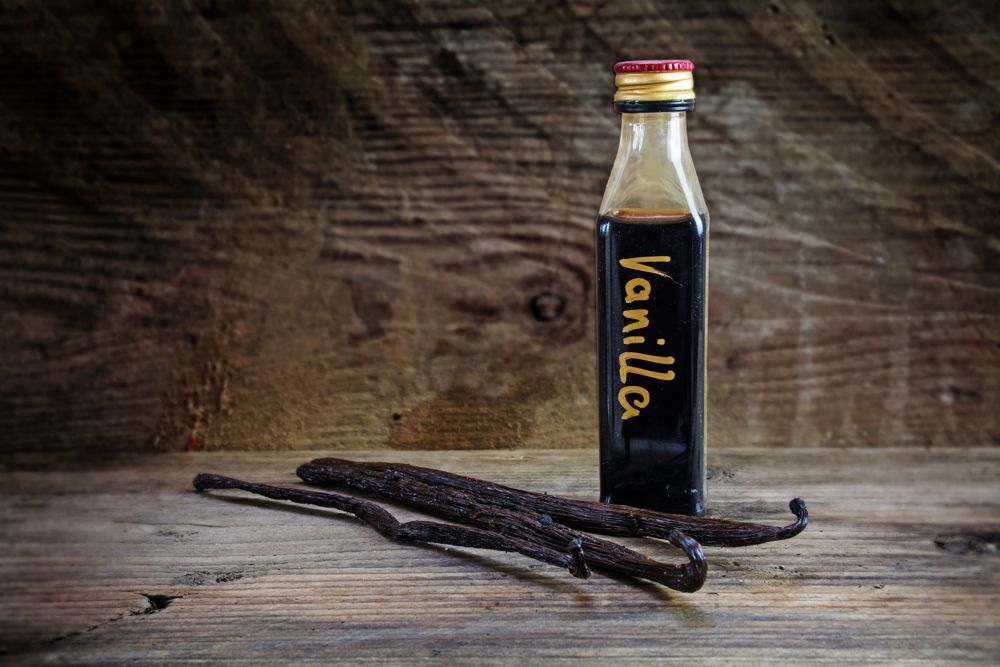 A bottle of homemade vanilla extract with vanilla beans